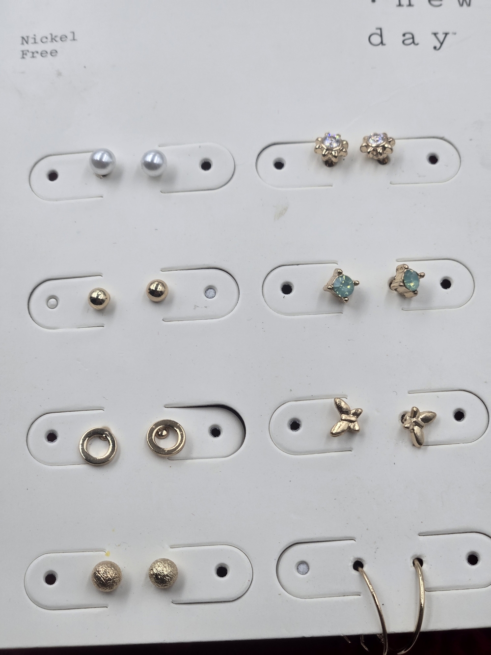 multi-pack of "A New Day" brand stud and hoop earrings sold at Target.